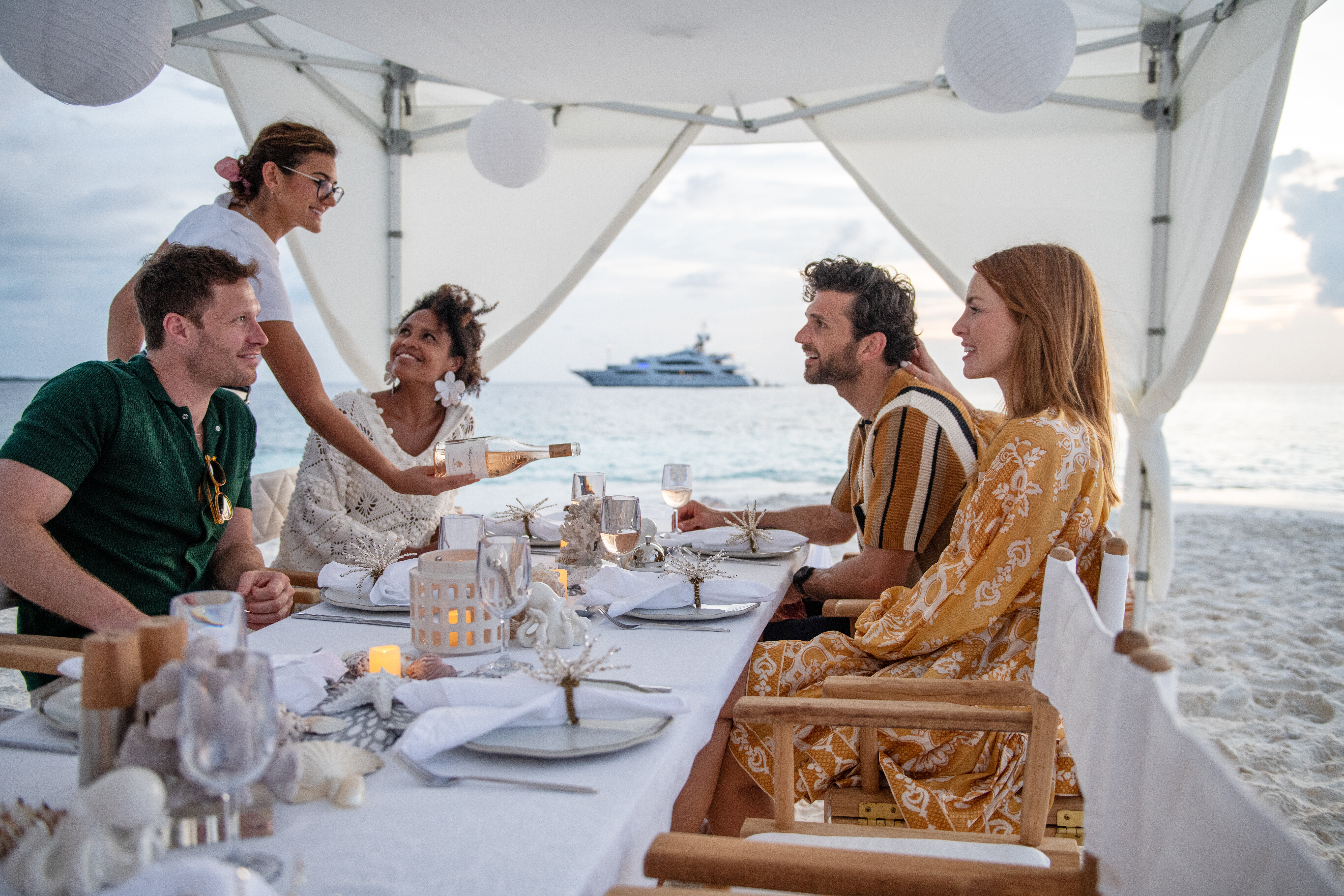 Champagne picnic set up on a Maldives sandbank