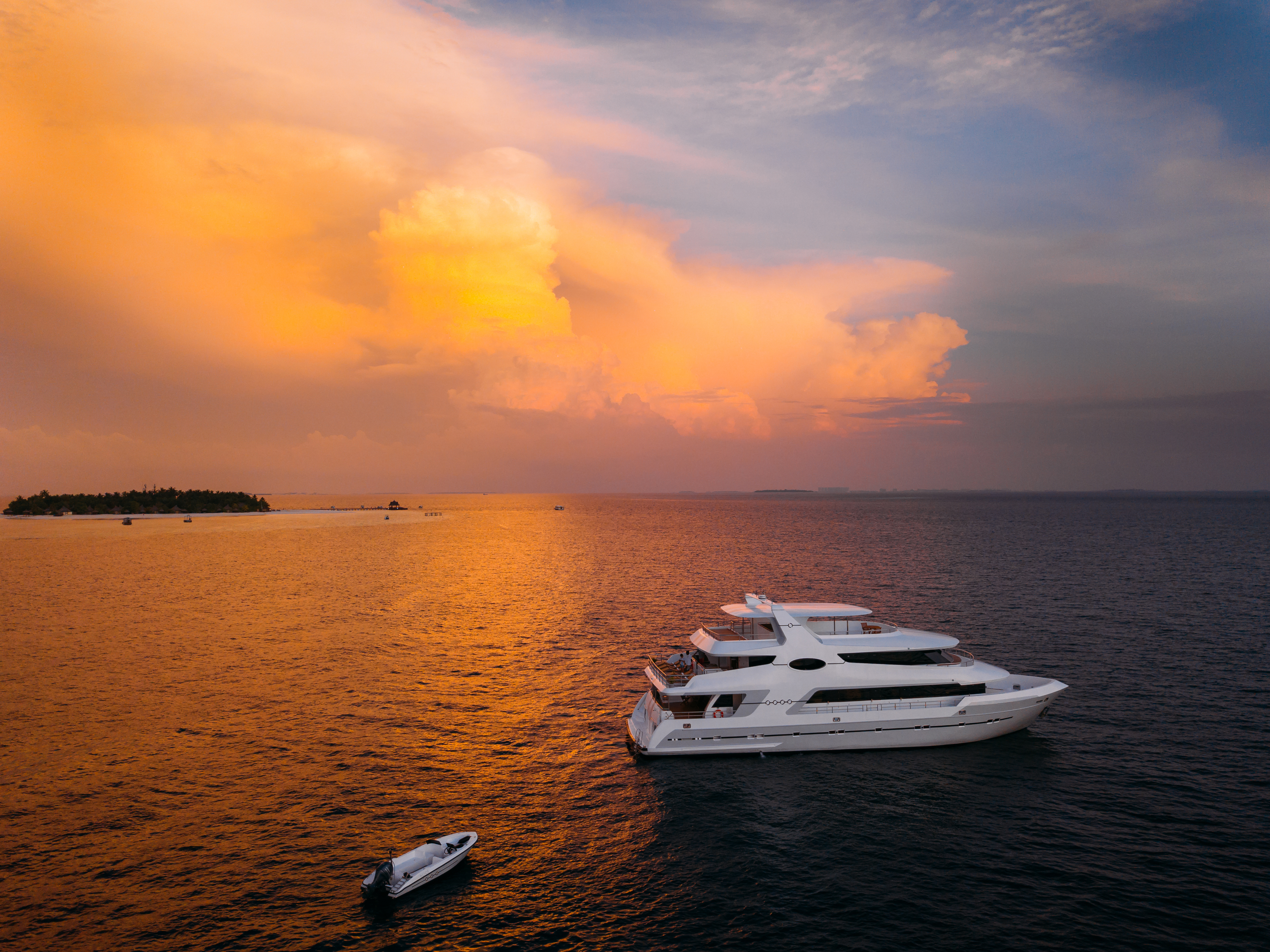 Golden-hour sky over the ocean in the Maldives